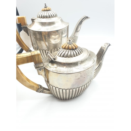 297 - Silver German made tea/coffee set comprising of teapot, coffee pot and sugar bowl made in 800 silver... 