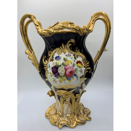 3 - A pair of H&R Daniel Baroque Vases glazed blue with gilded handles and laurels, slight hairline crac... 