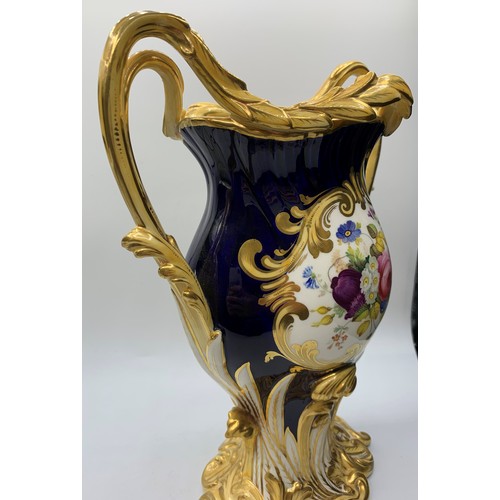 3 - A pair of H&R Daniel Baroque Vases glazed blue with gilded handles and laurels, slight hairline crac... 