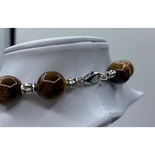 77 - A Tiger's eye Necklace and Earrings set