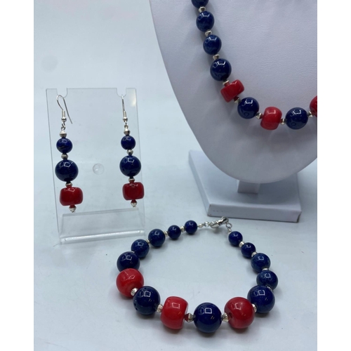 79 - One Lapis Lazuli and Red Coral Necklace, Bracelet and Earrings set together with another Lapis Lazul... 