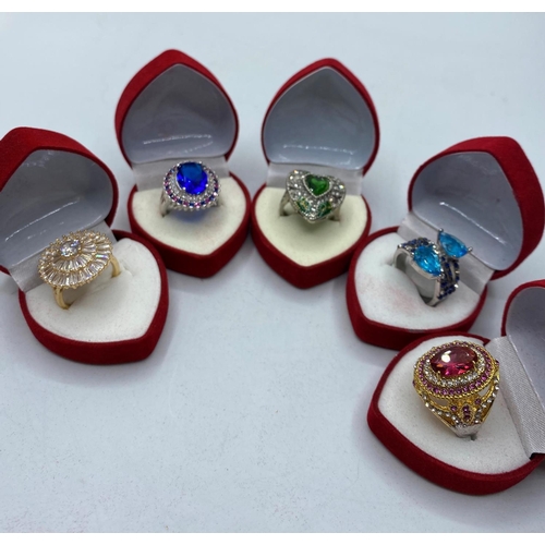 81 - Five boxed Rings stamped 925 with various gemstones (5)