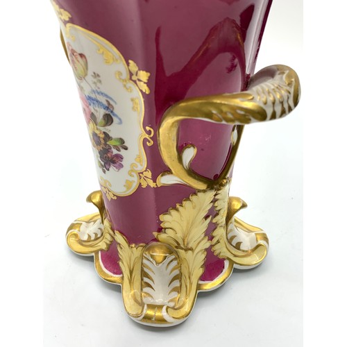 181 - H&R Daniel four footed maroon glaze Vase with floral theme, in good condition 18cm tall