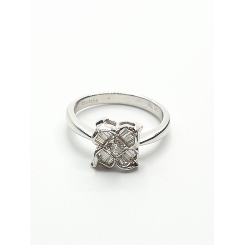 27 - 18ct White Gold Diamond Flower Ring with approx 0.38ct diamonds, weight 4.3g and size O