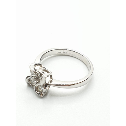 27 - 18ct White Gold Diamond Flower Ring with approx 0.38ct diamonds, weight 4.3g and size O