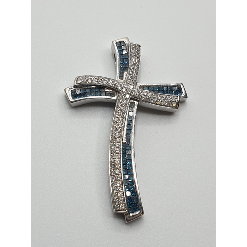 44 - (Withdraw)14ct White Gold with white and blue Diamond Cross, weight 8.7g and approx 1ct diamonds, 42... 