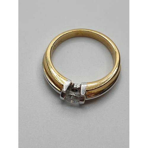 61 - 18ct 2 tone Gold Solitaire Diamond ring with approx 0.24ct, weight 6.4g and size M