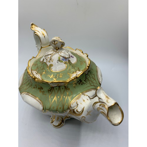 174 - H&R Daniel second bell shape Teapot in good Rococo style with slanted rose on lid in good condition