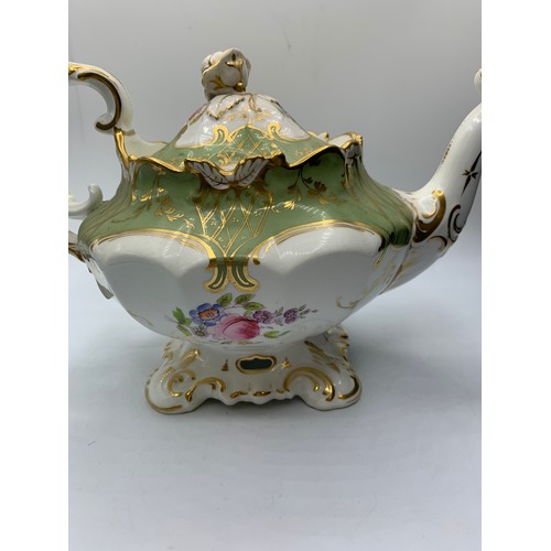 174 - H&R Daniel second bell shape Teapot in good Rococo style with slanted rose on lid in good condition