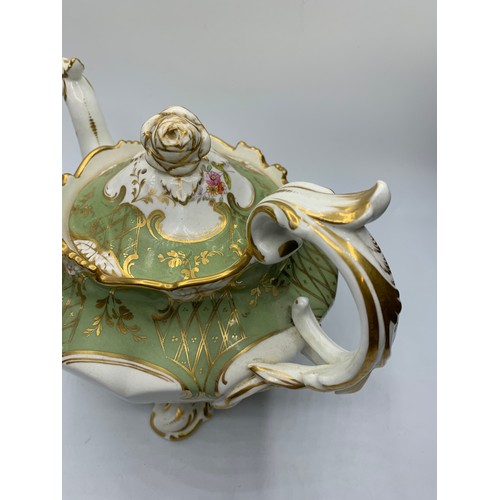 174 - H&R Daniel second bell shape Teapot in good Rococo style with slanted rose on lid in good condition