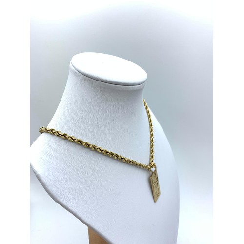 396 - 9ct yellow gold ingot pendant with full hallmark, on a 9ct gold chain 70cm,total weight 16.38g.