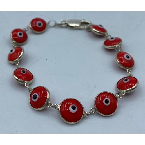 490 - Silver Mati Nazar Bracelet with Red Stones, 19cm long and marked 925