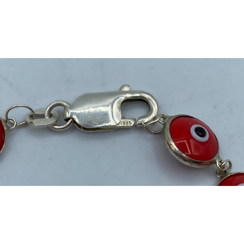 490 - Silver Mati Nazar Bracelet with Red Stones, 19cm long and marked 925