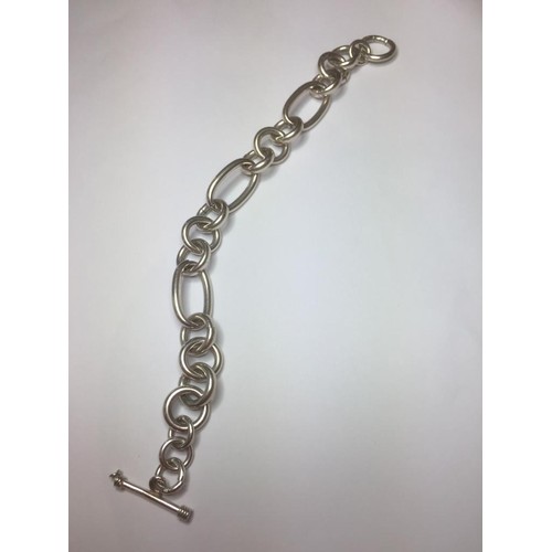 219 - Silver Bracelet with large oval and round links, having a T Bar clasp and hallmark showing on the T ... 