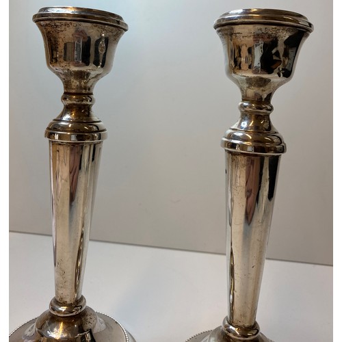 222 - Pair of Silver Candlesticks Tapered Towards Base, base having beading to edge.Good Hallmark showing ... 