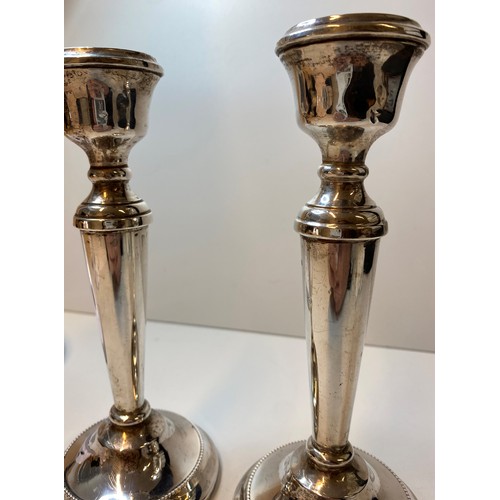 222 - Pair of Silver Candlesticks Tapered Towards Base, base having beading to edge.Good Hallmark showing ... 