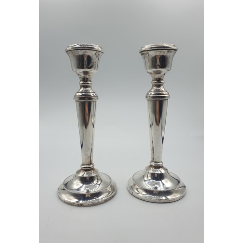 222 - Pair of Silver Candlesticks Tapered Towards Base, base having beading to edge.Good Hallmark showing ... 