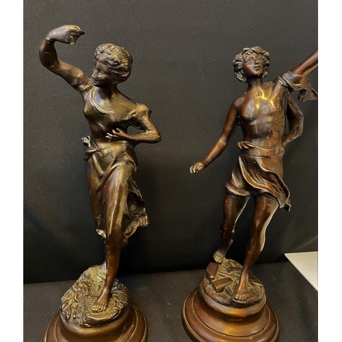 410 - Pair of patinated large Bronzes signed Rousseau to base (2)