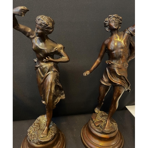 410 - Pair of patinated large Bronzes signed Rousseau to base (2)