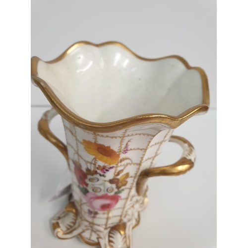 197 - H&R Daniel four footed Vase with floral and gold decoration in good condition, 15cm tall