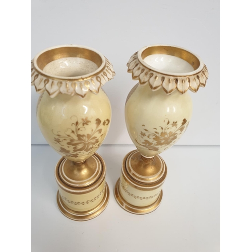 199 - A heavily repaired pair of H&R Daniel baluster Vases floral theme, 16cm tall (2)