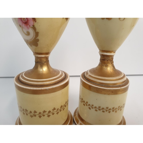 199 - A heavily repaired pair of H&R Daniel baluster Vases floral theme, 16cm tall (2)