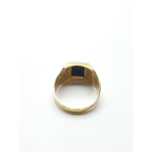 109 - Gentleman 18ct Gold Ring with black centre Stone as new, weight 8.3g and size U