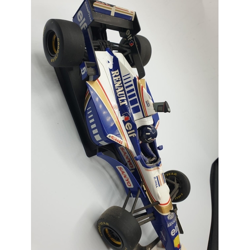 220 - First Edition Model of Damon Hills Race Car with authentic livery from 1996, no 2053, 23cm long appr... 