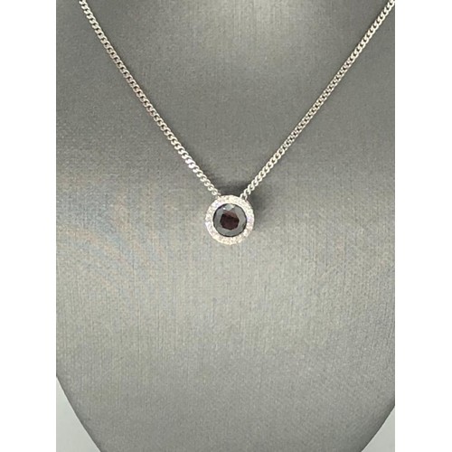 289 - 18K White Gold Pendant with 1ct Black Diamond centre and 0.16ct white diamonds surrounds, set on 18k... 