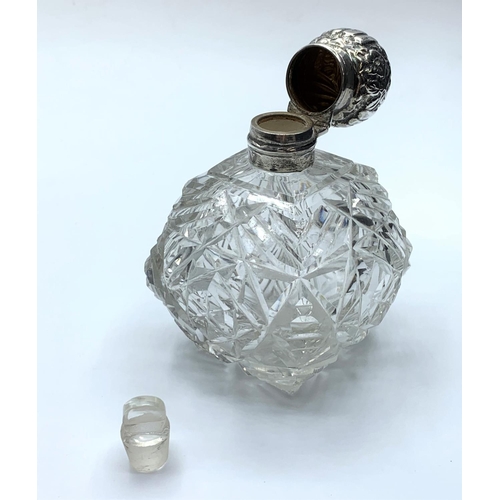 236 - Antique Silver topped cut glass Scent Bottle, having a clear hallmark for Birmingham 1893, hinged li... 