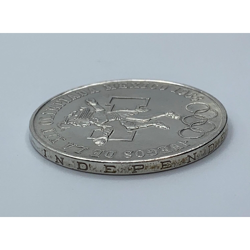 240 - Silver 25 Peso Coin from the Mexico Olympics 1968, uncirculated and good condition, still having cle... 