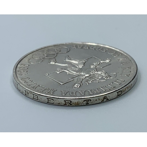 240 - Silver 25 Peso Coin from the Mexico Olympics 1968, uncirculated and good condition, still having cle... 