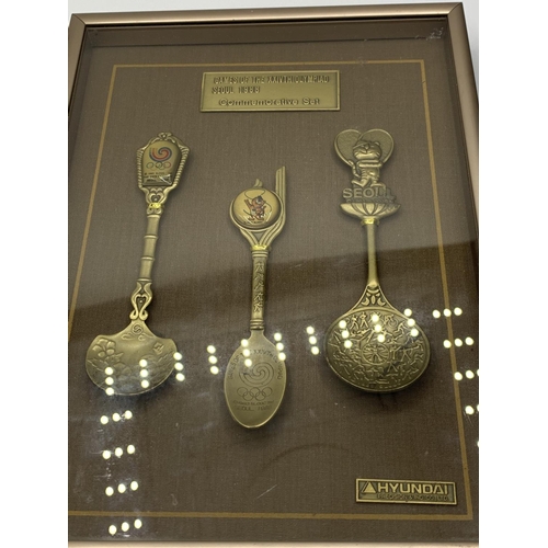 242 - Set of 3 Olympic Games Commemorative Spoons from the 1988 Games in Seoul, South Korea. 
The spoons a... 