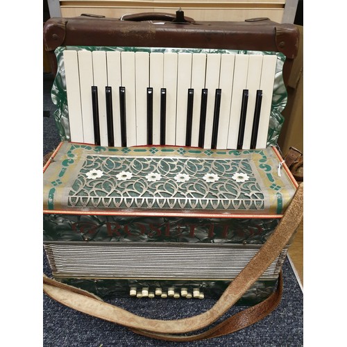 9 - A Vintage 'Rosetts' Accordian, Bellows in good working order but one key needs a new spring, comes i... 