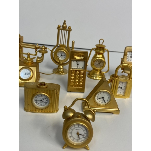 121 - Ten Novelty Miniature Quartz Clocks, all under 7cm tall (10)