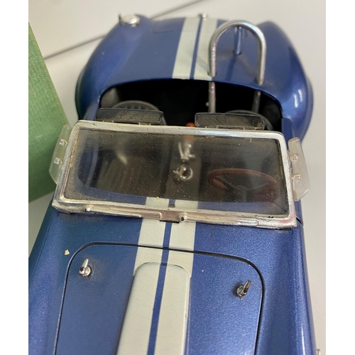 207 - Scale Model (1-18) of a 1967 A.C.Cobra with registration Book from the 'Crestley Collection', 22cm l... 