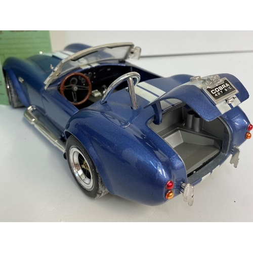 207 - Scale Model (1-18) of a 1967 A.C.Cobra with registration Book from the 'Crestley Collection', 22cm l... 