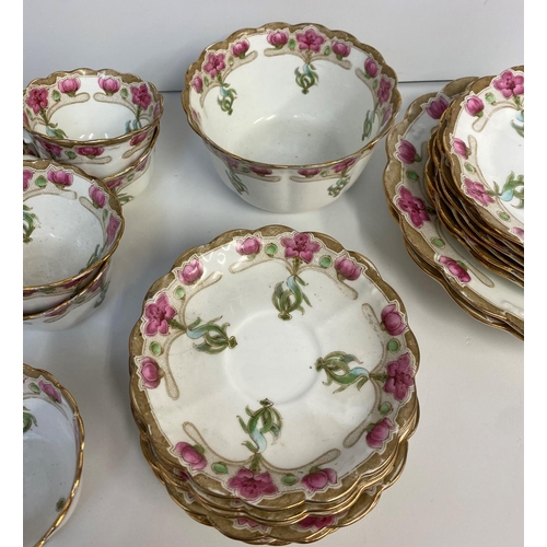 7 - A Chapman England Floral Bone China Tea set, comprising of 6 cups and saucers, 6 side plates and 2 s... 