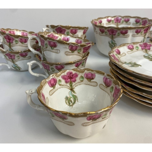 7 - A Chapman England Floral Bone China Tea set, comprising of 6 cups and saucers, 6 side plates and 2 s... 