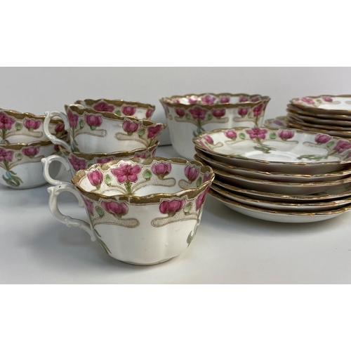 7 - A Chapman England Floral Bone China Tea set, comprising of 6 cups and saucers, 6 side plates and 2 s... 