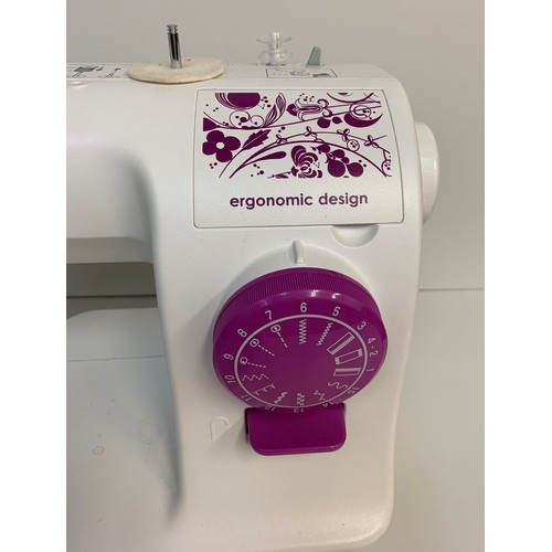 226 - Toyota Home Sewing Machine, ergonomic design with instruction booklet, 38x28cm approx