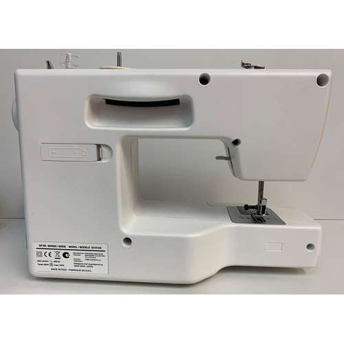 226 - Toyota Home Sewing Machine, ergonomic design with instruction booklet, 38x28cm approx