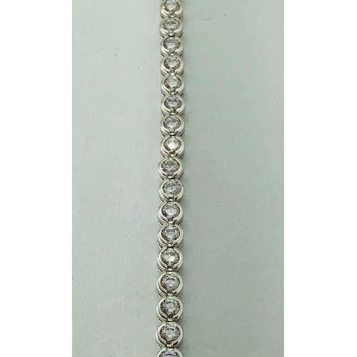 335 - Sterling Silver Bracelet with CZ stones, weight 15.3g and 7.5