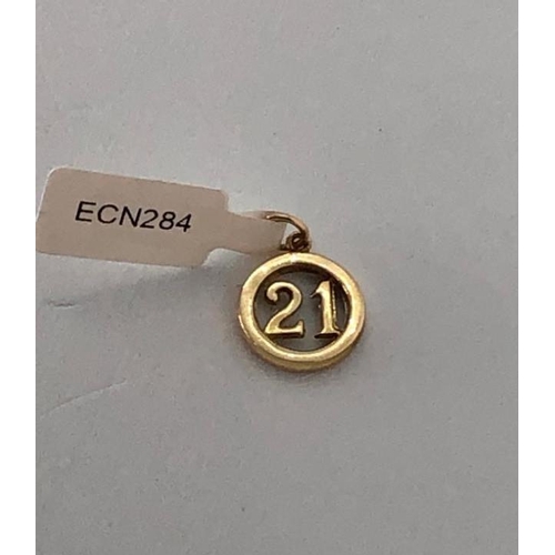 353 - 9K Yellow Gold 21 Pendant, weight 0.9g (ecn284)