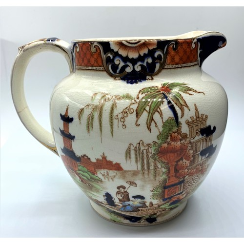 256 - Nice example of a Burma Oriental themed Jug with cracked glazed finish (repair on handle), 14cm tall