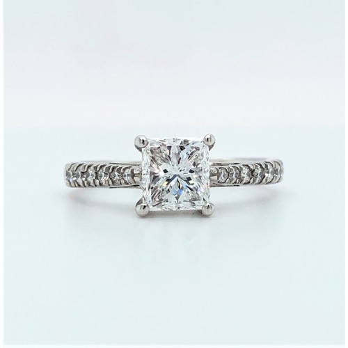 22 - Platinum ring with 1ct Diamond centre (D/SI1) and 0.17cts diamonds on shoulders, weight 3.14g and si... 