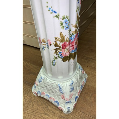 280 - A Porcelain Jardiniere on a classic column plynth in white with floral decoration