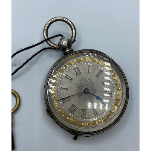 213 - Silver open faced Ladies Pocket Watch circa 1890, having floral design chase work to case which  ope... 