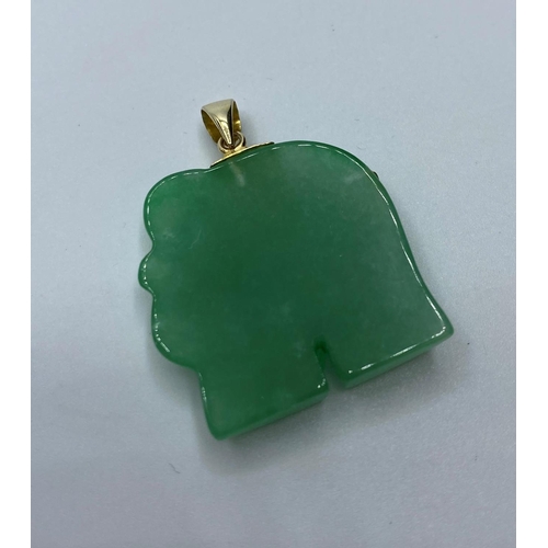 435 - Green Jade Elephant Pendant with Ruby eye and yellow metal detail (A/F)