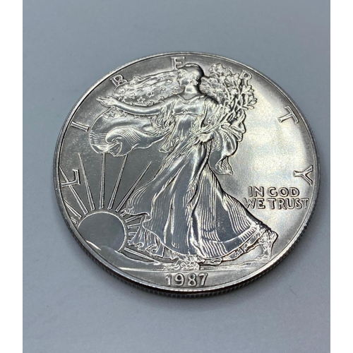 436 - Silver Liberty Walking Dollar 1987, 99.9% fine silver and uncirculated, good condition